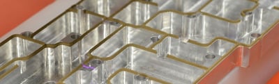 Solving the Problem of an Aggressive Timeline: Quick-turn RF Shielding Components with FIP Gaskets
