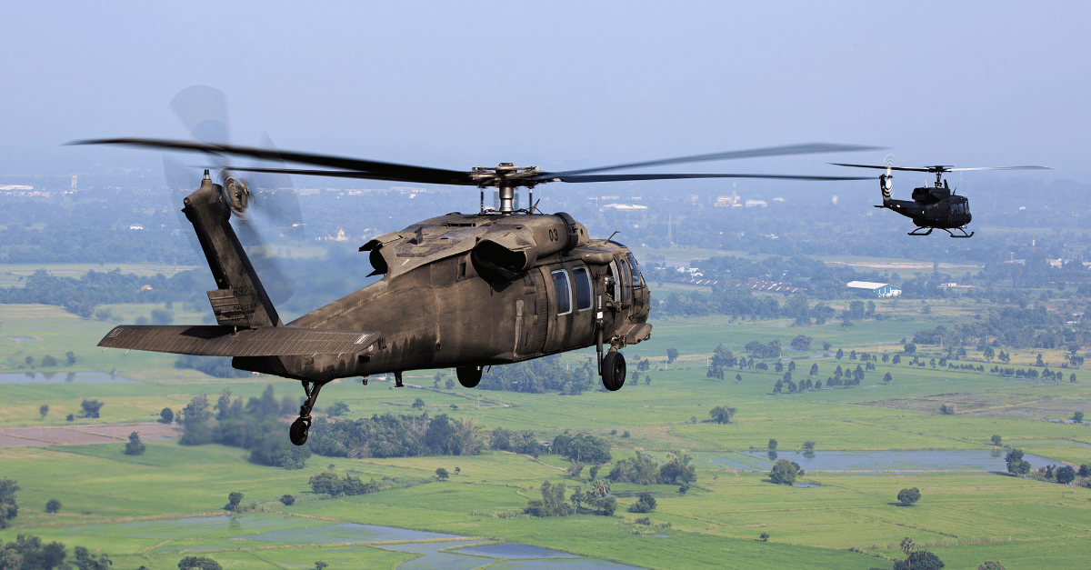military helicopters in the air