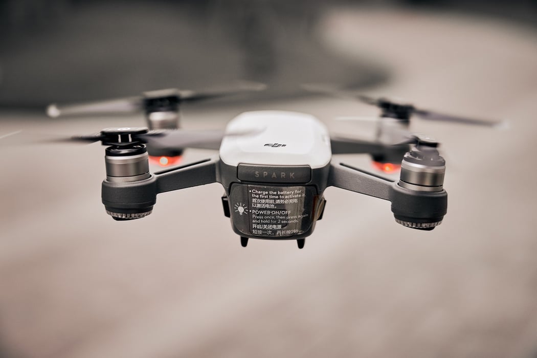 flying-white-drone-tilt-shift-lens-photography-1087180